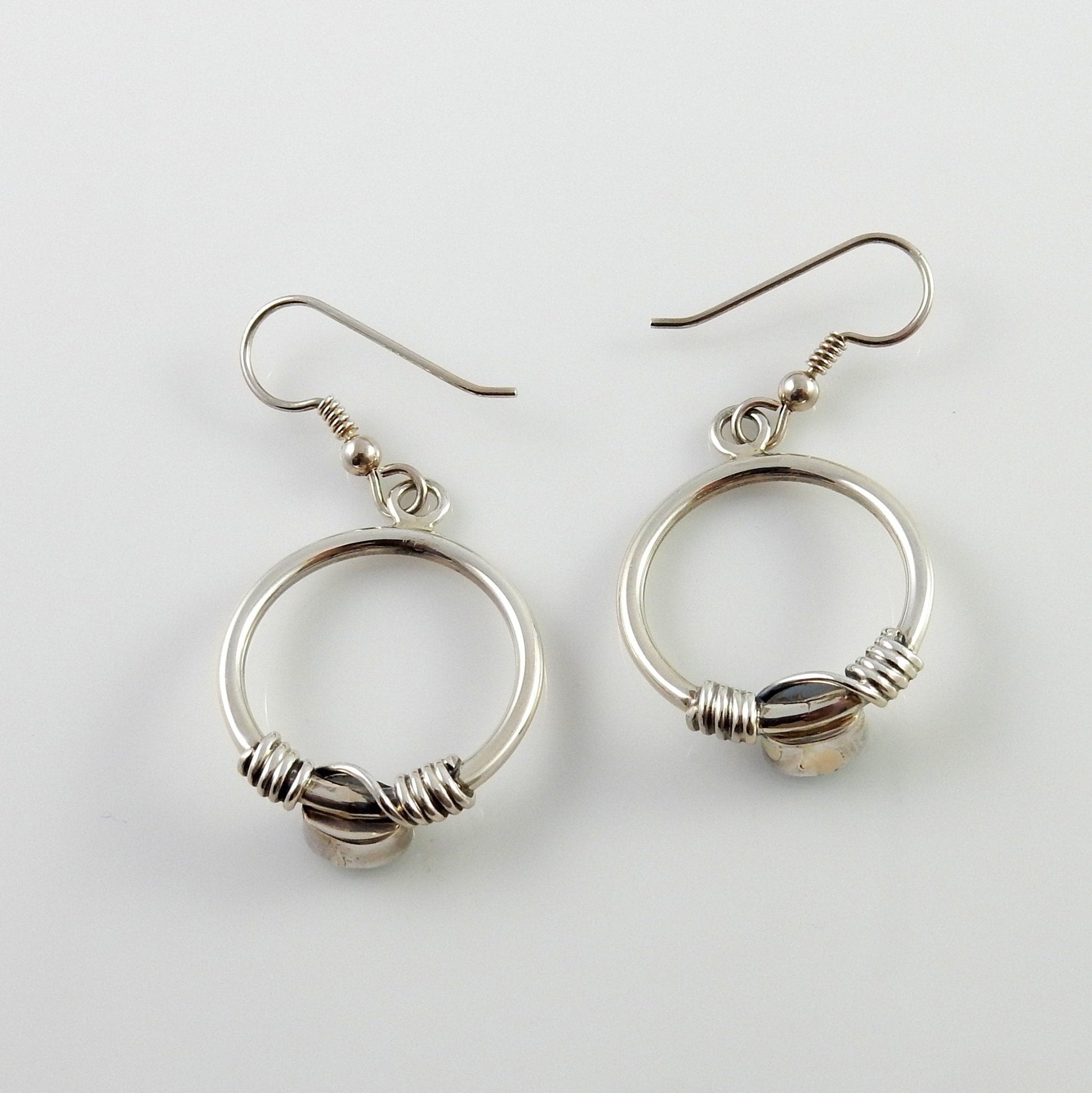 Sterling Silver Blue Topaz Round Earrings - DeSantis