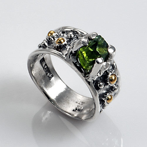 Nice two toned silver and gold peridot ring