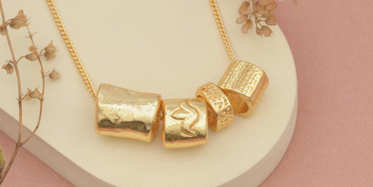 Opal Pendants and Urn Pendants: A Buying Guide for Two of Our Most Asked-About Pieces
