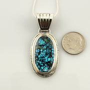 Sterling Silver Spiderweb Turquoise Pendant