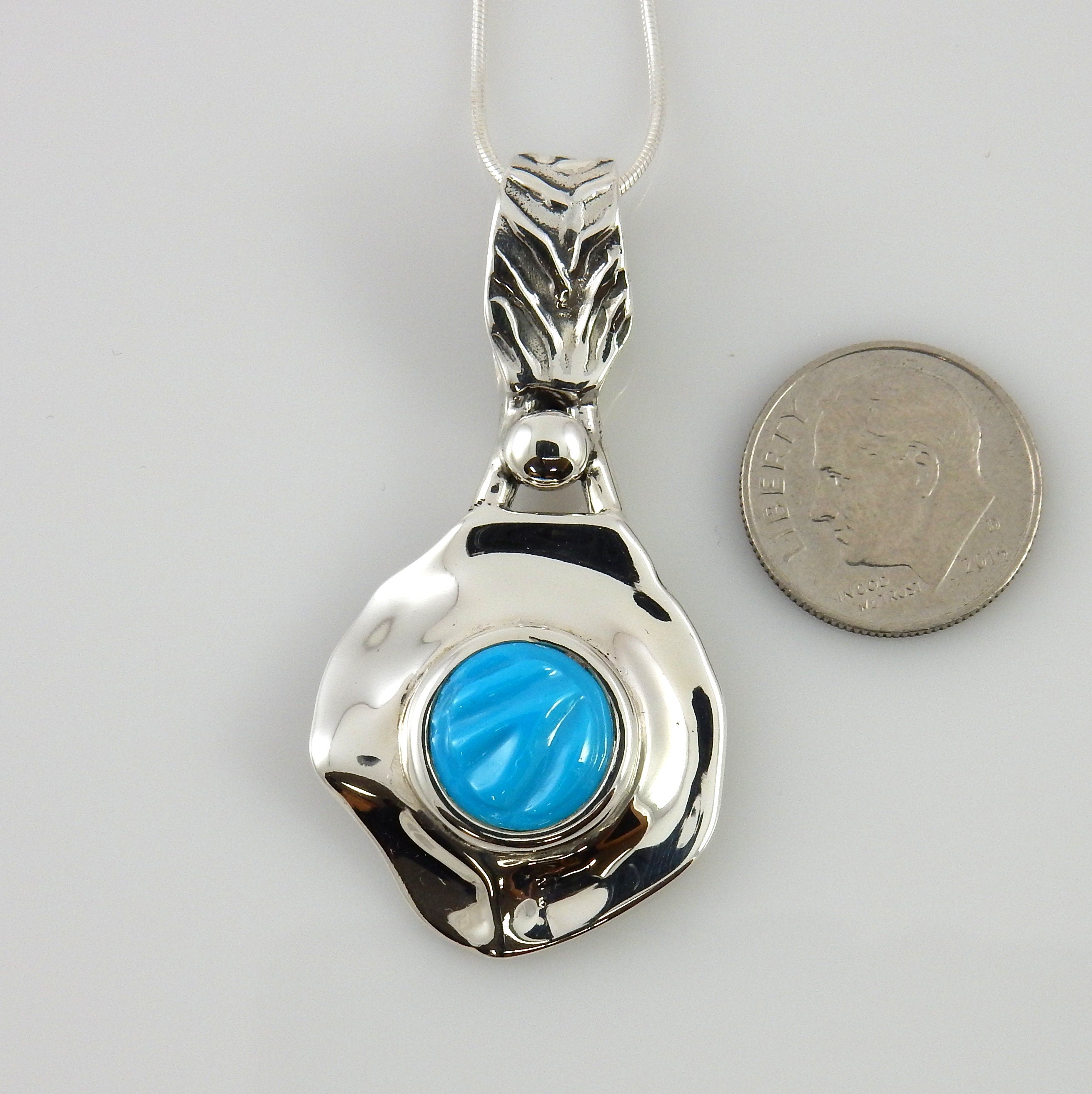 Sterling Silver Carved Turquoise Inlay Pendant