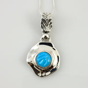 Sterling Silver Carved Turquoise Inlay Pendant