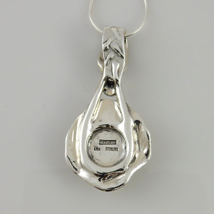 Sterling Silver Carved Turquoise Inlay Pendant