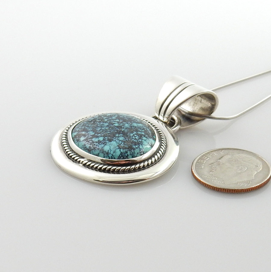 Sterling Silver Spiderweb Turquoise Pendant