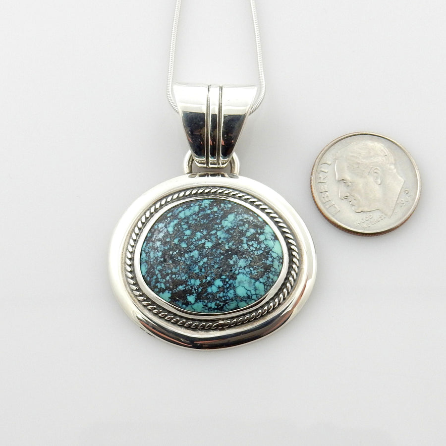 Sterling Silver Spiderweb Turquoise Pendant