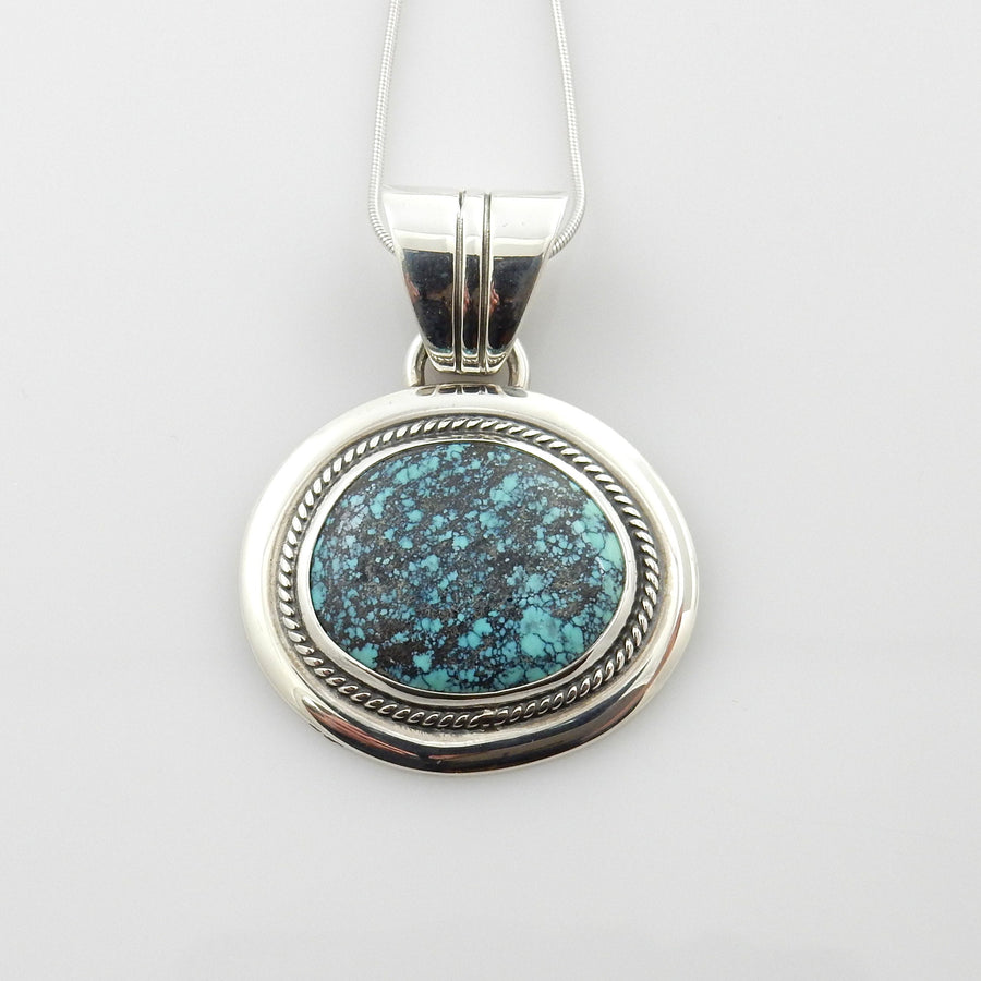 Sterling Silver Spiderweb Turquoise Pendant