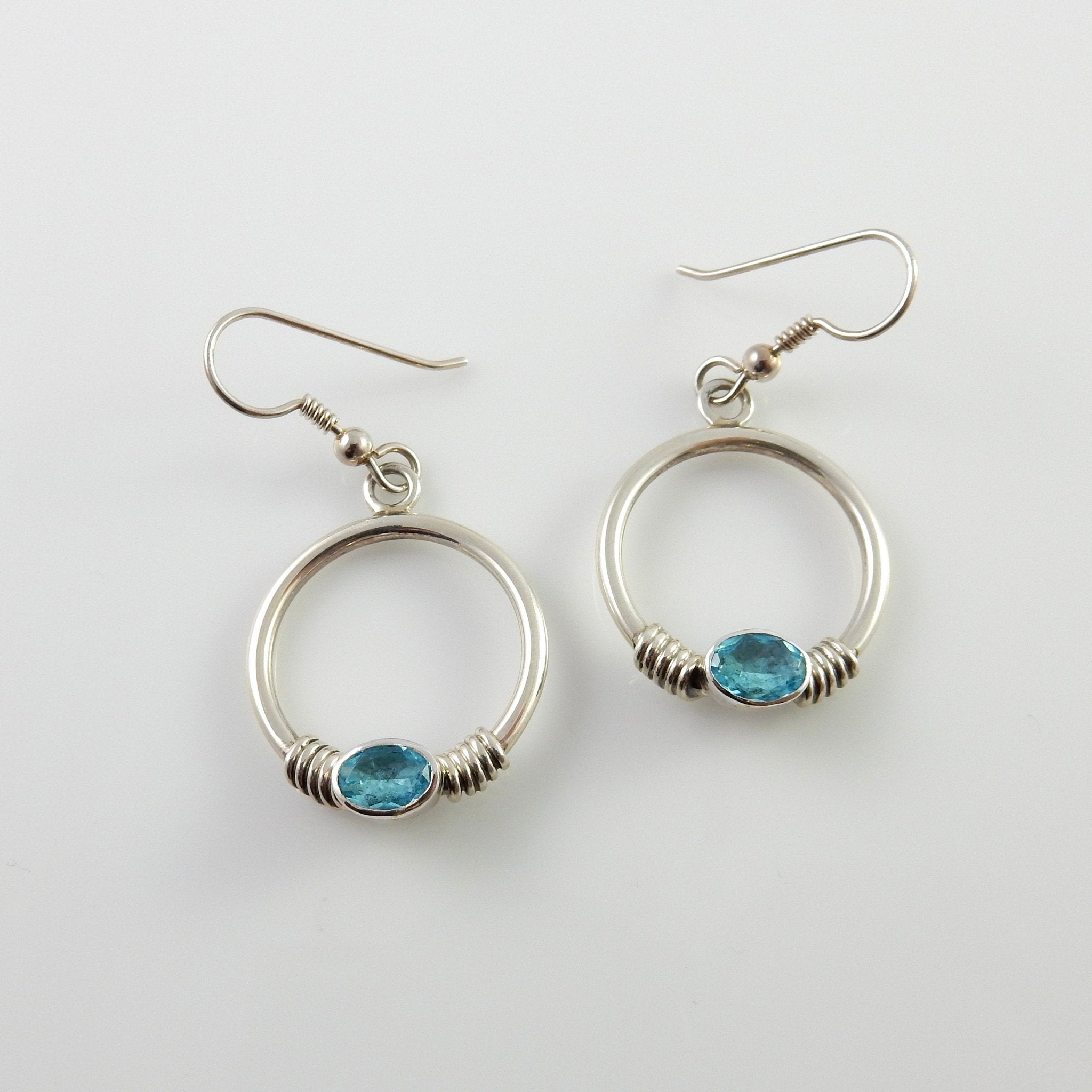 Sterling Silver Blue Topaz Round Earrings - DeSantis