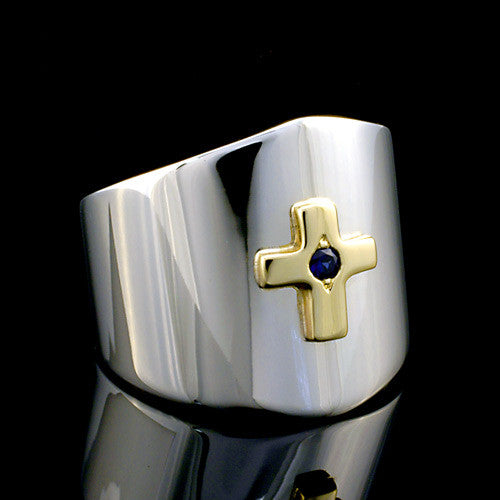 Stylish two toned silver and gold sapphire cross ring