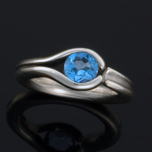 Unique blue topaz sterling silver tension set ring